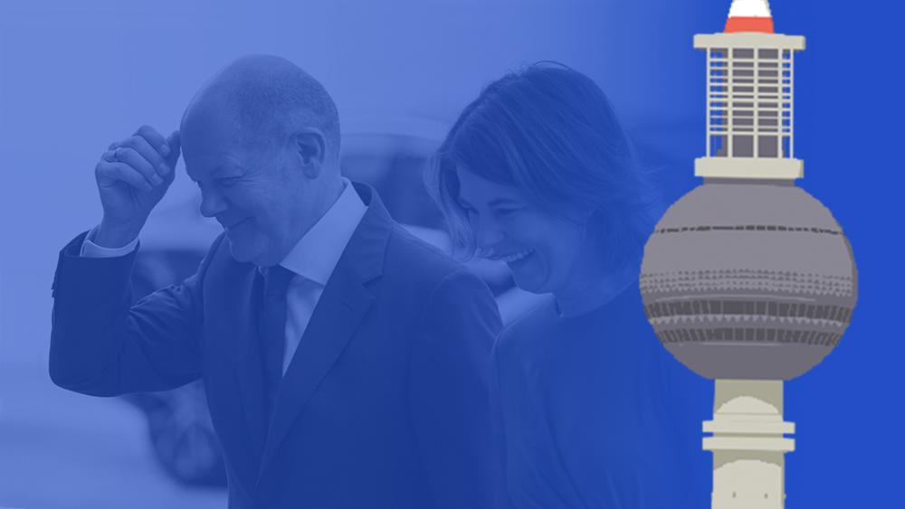 German Chancellor Olaf Scholz walks with German Foreign Minister Annalena Baerbock as he arrives at the Petersberg Climate Dialogue in Berlin, Germany July 18, 2022.