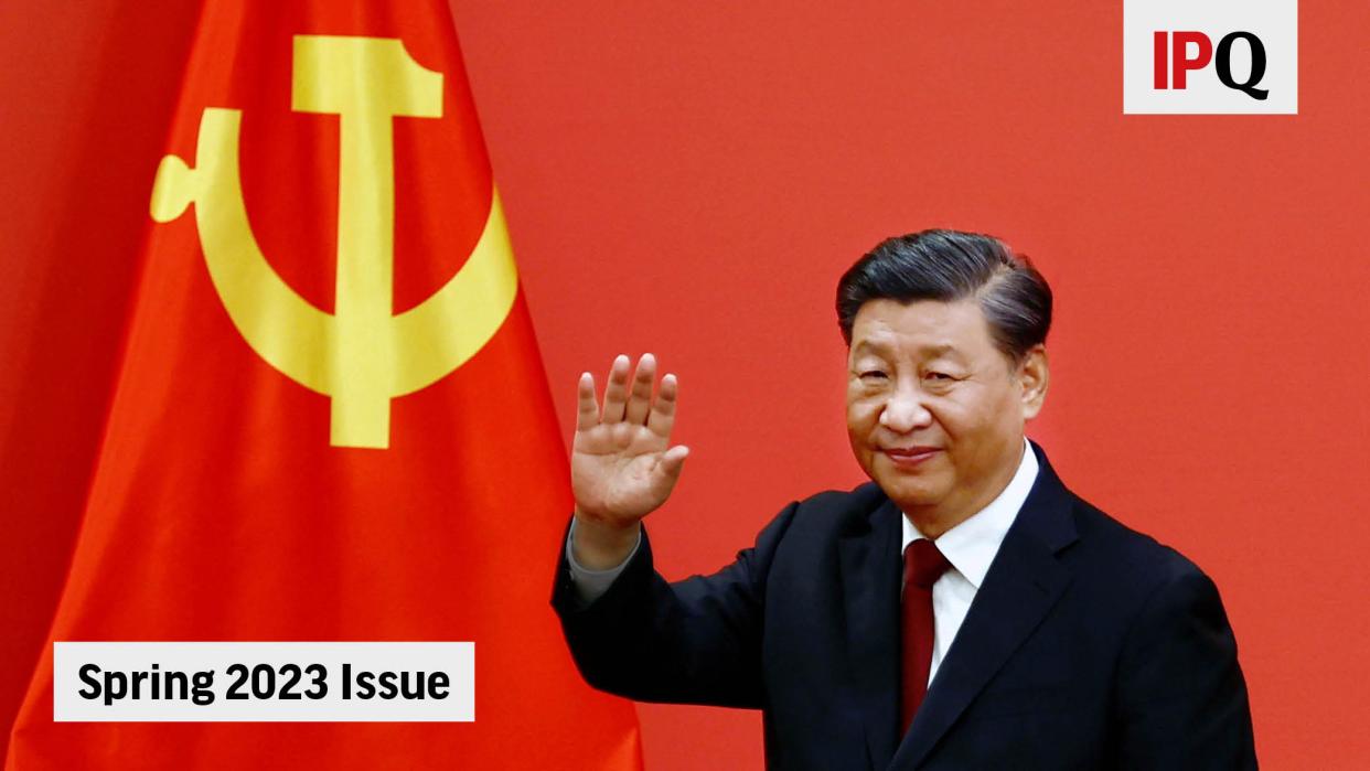Chinese President Xi Jinping waves after his speech as the new Politburo Standing Committee members meet the media following the 20th National Congress of the Communist Party of China, at the Great Hall of the People in Beijing, China October 23, 2022.