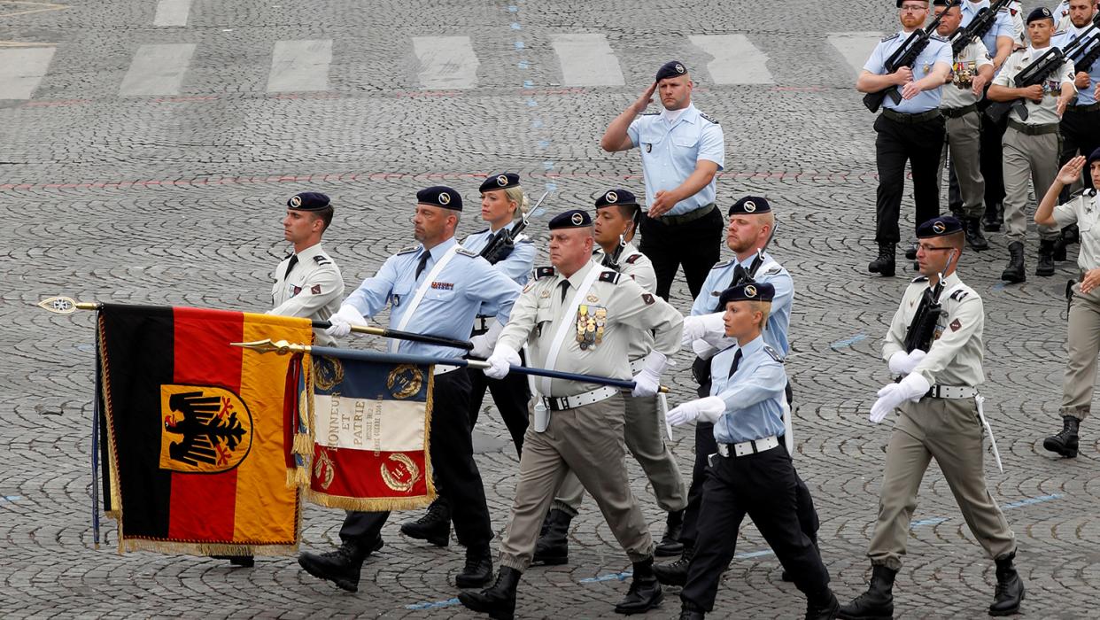 Soldiers of the Franco-German Brigade march during the traditional Bastille Day military parade on the Champs-Elysees Avenue in Paris, France, July 14, 2019.