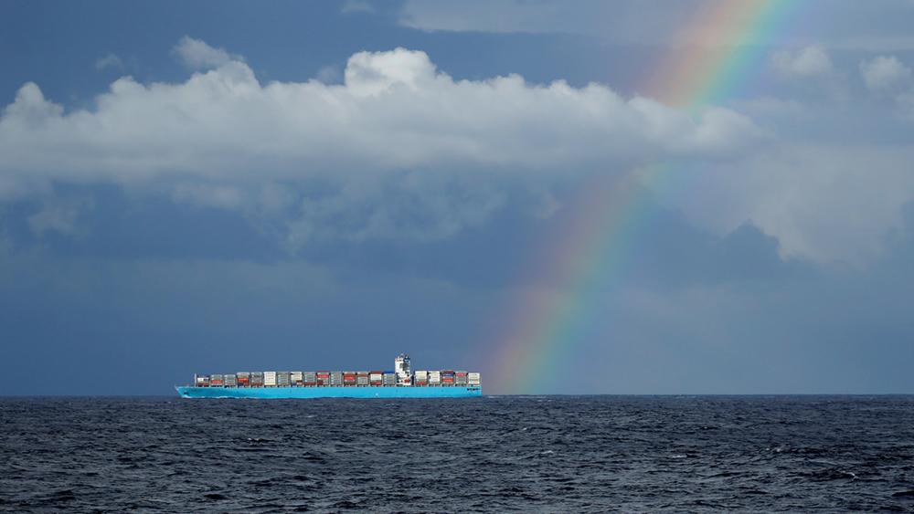 A rainbow is seen over the container ship 'Maersk Genoa' as it sails off the northern coast of Tunisia in the central Mediterranean December 1, 2018.