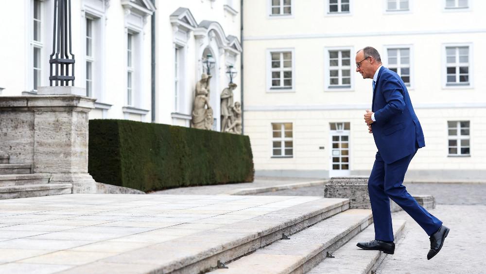 Friedrich Merz, leader of the conservative Christian Democratic Union (CDU) party walks, outside of the Bellevue Palace, after German Chancellor Olaf Scholz sacked Finance Minister Christian Lindner, in Berlin, Germany, November 7, 2024.