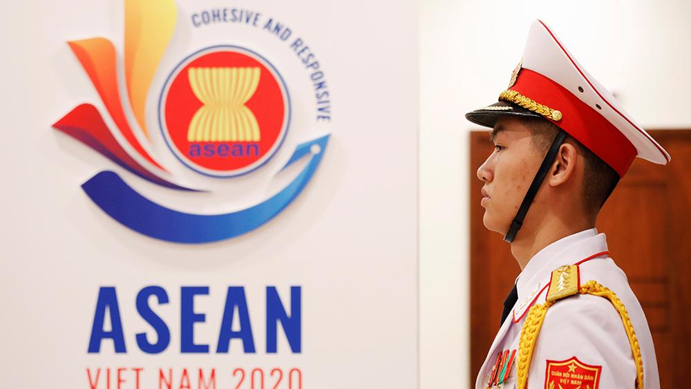 A military soldier stands guard at the ASEAN summit in Hanoi, Vietnam November 12, 2020.
