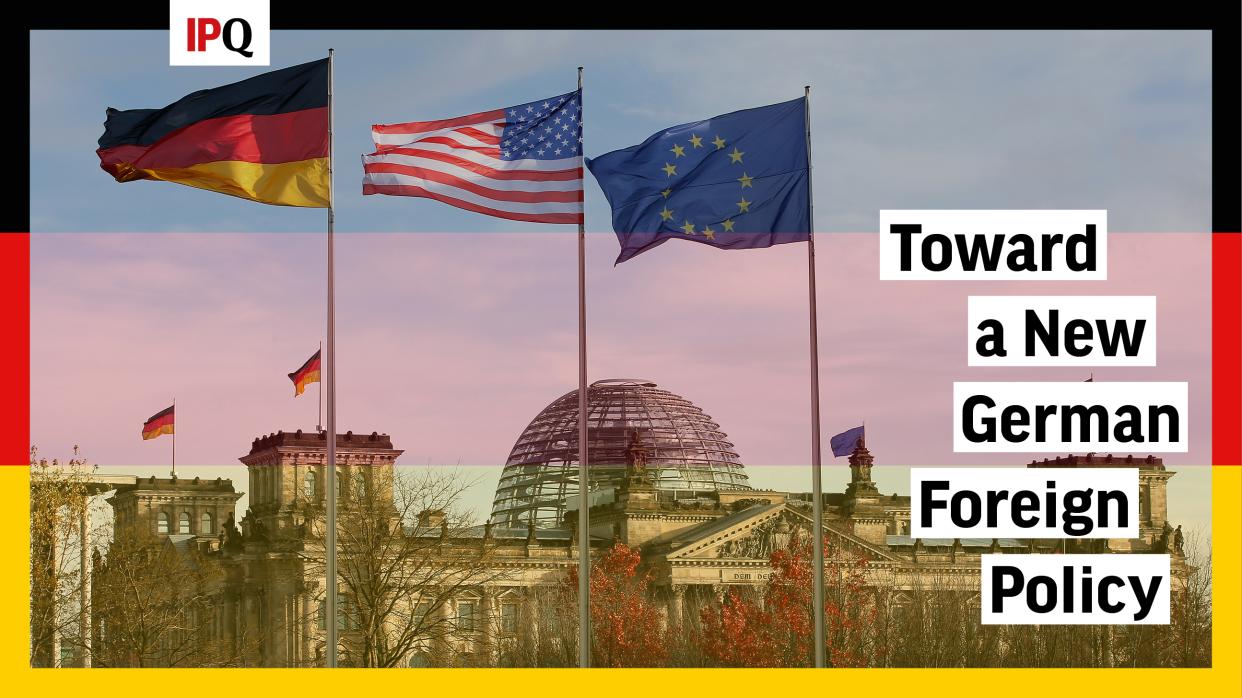 German, US and EU flags fly in front of the Reichstag building ahead of the meeting between US President Obama and German Chancellor Merkel in Berlin.