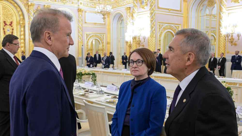 Sberbank CEO Herman Gref, Russian Central Bank Governor Elvira Nabiullina and Tatarstan head Rustam Minnikhanov (L-R) at a meeting between Russia's President Vladimir Putin and Emir of Qatar, Sheikh Tamim bin Hamad Al Thani, at the Moscow Kremlin, April 17, 2025.