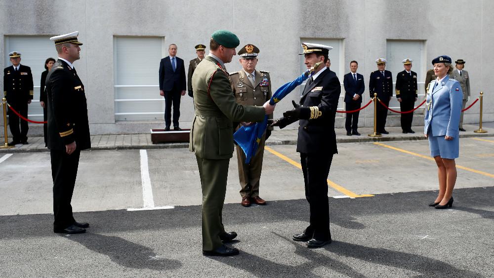 British Major General Charles Richard Stickland gives the EU flag to the Spanish Vice Admiral Antonio Martorell during the ceremony of transfer of authority of the leadership of European Union Atalanta Operation which is in charge of counter-piracy in the Indian Ocean, at the naval airbase in Rota, near Cadiz, southern Spain March 29, 2019.