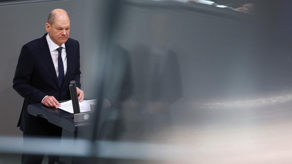 German Chancellor Olaf Scholz looks on as he delivers a speech during a budget session of Germany's lower house of parliament, the Bundestag, in Berlin, Germany, March 23, 2022.
