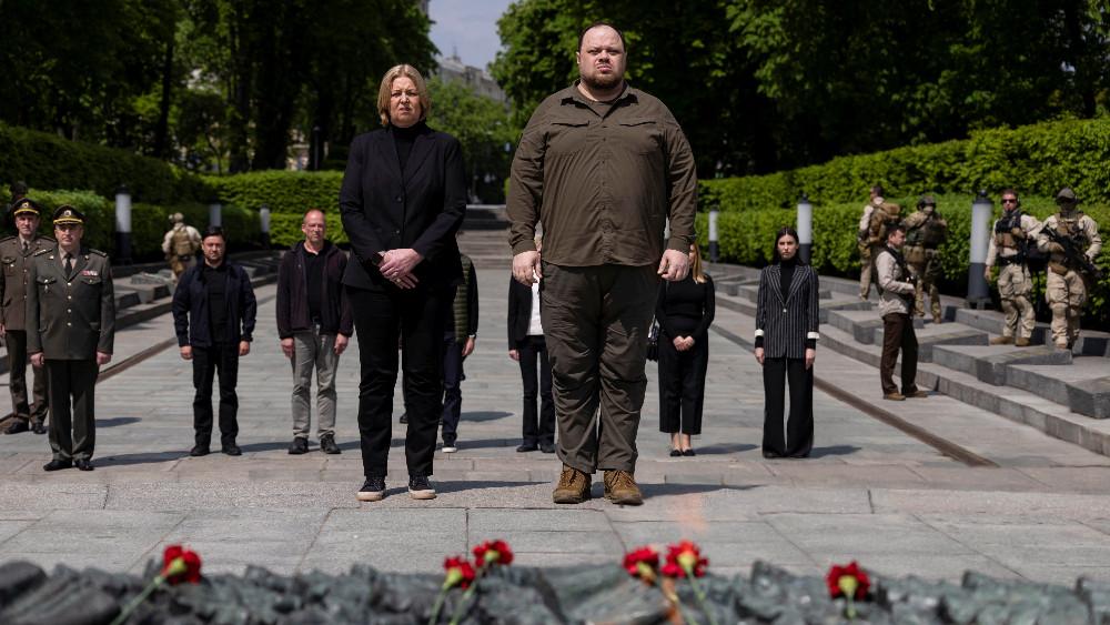 German Parliament President Baerbel Bas accompanied by Ukrainian Parliament Speaker Ruslan Stefanchuk attend a wreath-laying ceremony at the Tomb of the Unknown Soldier, as Russia's attack on Ukraine continues, in Kyiv, Ukraine May 8, 2022.