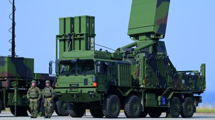 Soldiers stand next to the IRIS-T SLM air defense system at the German army Bundeswehr barracks Todendorf in Panker, Germany September 4, 2024.