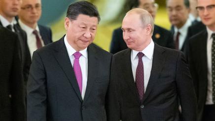 Russian President Vladimir Putin and Chinese President Xi Jinping walk during their meeting at the Kremlin in Moscow, Russia June 5, 2019.