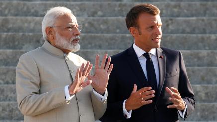 French President Emmanuel Macron and Indian Prime Minister Narendra Modi gesture before a meeting at the Chateau of Chantilly, near Paris, France August 22, 2019.