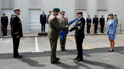 British Major General Charles Richard Stickland gives the EU flag to the Spanish Vice Admiral Antonio Martorell during the ceremony of transfer of authority of the leadership of European Union Atalanta Operation which is in charge of counter-piracy in the Indian Ocean, at the naval airbase in Rota, near Cadiz, southern Spain March 29, 2019.