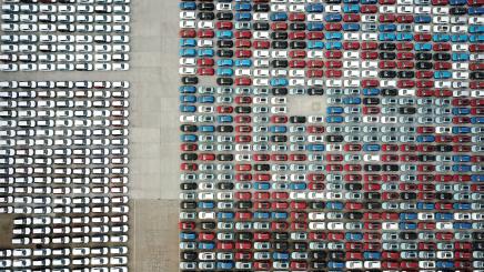 Cars for export are seen at a port in Lianyungang, Jiangsu province, China April 2, 2020.