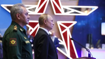 DOCUMENT DATE: 21 December, 2021 Russian President Vladimir Putin and Defence Minister Sergei Shoigu attend a military exhibition before an expanded meeting of the Defence Ministry Board in Moscow, Russia December 21, 2021.