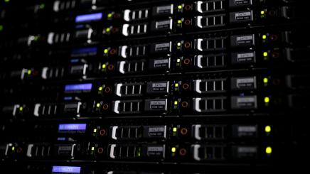 Lights illuminate rack servers inside the data center of Equinix in Pantin, outside Paris, France, December 7, 2016.