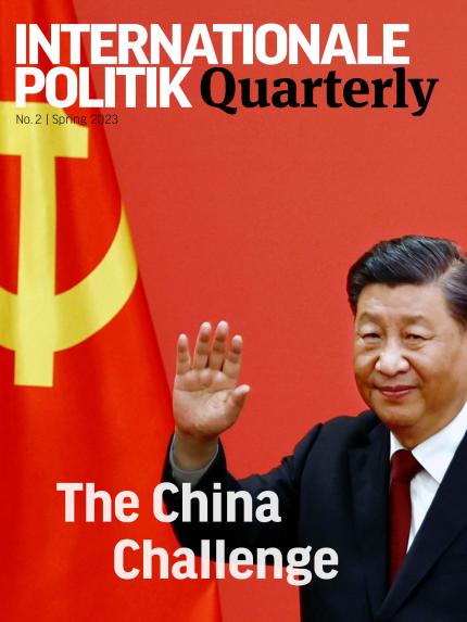 Chinese President Xi Jinping waves after his speech as the new Politburo Standing Committee members meet the media following the 20th National Congress of the Communist Party of China, at the Great Hall of the People in Beijing, China October 23, 2022. REUTERS/Tingshu Wang